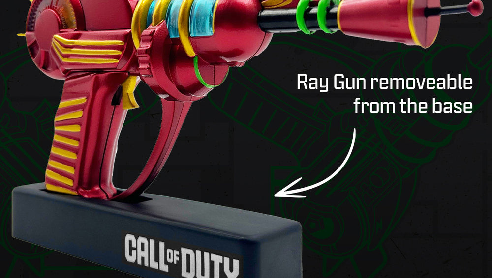Closeup of Call of Duty Zombies Ray Gun 3D Lamp showing "Ray Gun removeable from the base"